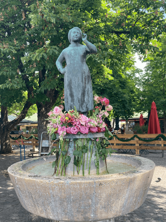 Drinking Water Fountain with Statue of Liesl Karlstadt at Viktualienmarkt in Munich
